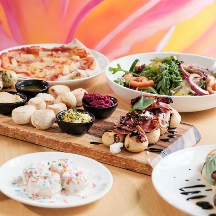 DoughBalls Pizza Restaurant Adelaide homepage image of DoughBalls pizza, Salad, Picking Plate and Desert.